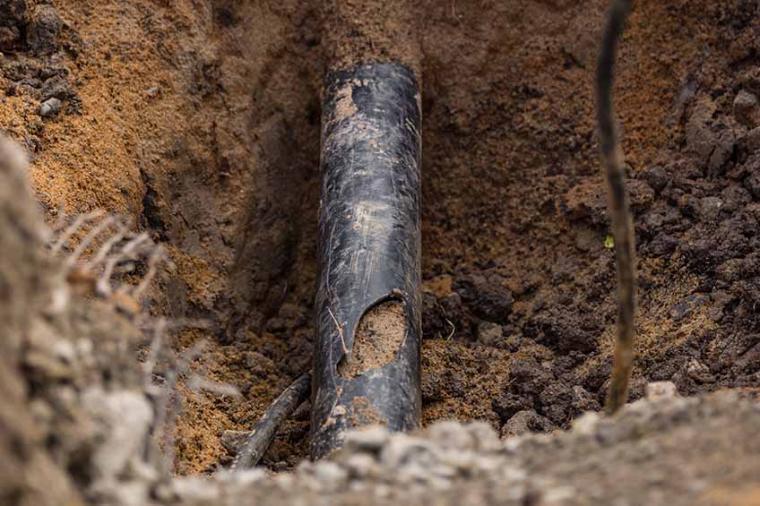 Damaged pipe line being rehabilitated